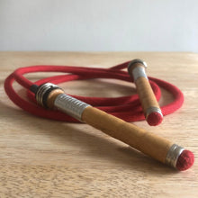 Load image into Gallery viewer, Traditional skipping ropes hand made in the UK. Our retro style ropes are made from natural materials and the handles are recycled mill bobbins. These vintage skipping ropes are great fun for kids and adults alike with a range of lengths including a playground rope.
