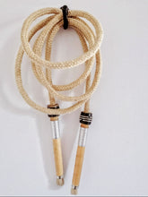 Load image into Gallery viewer, Traditional skipping ropes hand made in the UK. Our retro style ropes are made from natural materials and the handles are recycled mill bobbins. These vintage skipping ropes are great fun for kids and adults alike with a range of lengths including a playground rope.