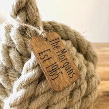 Load image into Gallery viewer, Country cottage inspired natural rope door stop, hand laid natural fibre flax hemp rope made in the UK crafted into a monkey fist knot doorstop