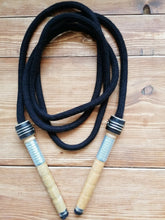 Load image into Gallery viewer, Traditional skipping ropes hand made in the UK. Our retro style ropes are made from natural materials and the handles are recycled mill bobbins. These vintage skipping ropes are great fun for kids and adults alike with a range of lengths including a playground rope. 
