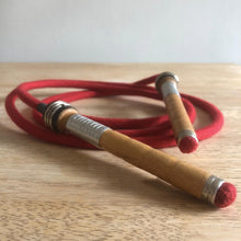 Load image into Gallery viewer, Traditional skipping ropes hand made in the UK. Our retro style ropes are made from natural materials and the handles are recycled mill bobbins. These vintage skipping ropes are great fun for kids and adults alike with a range of lengths including a playground rope. 
